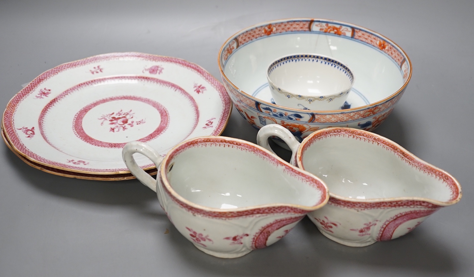 A group of 18th century chinese export: two plates, two sauceboats, a bowl and a tea bowl